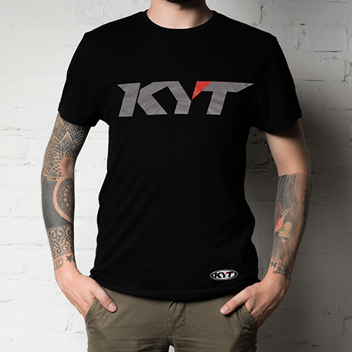 Model Facing Camera wearing a Black KYT Short Sleeve T-shirt