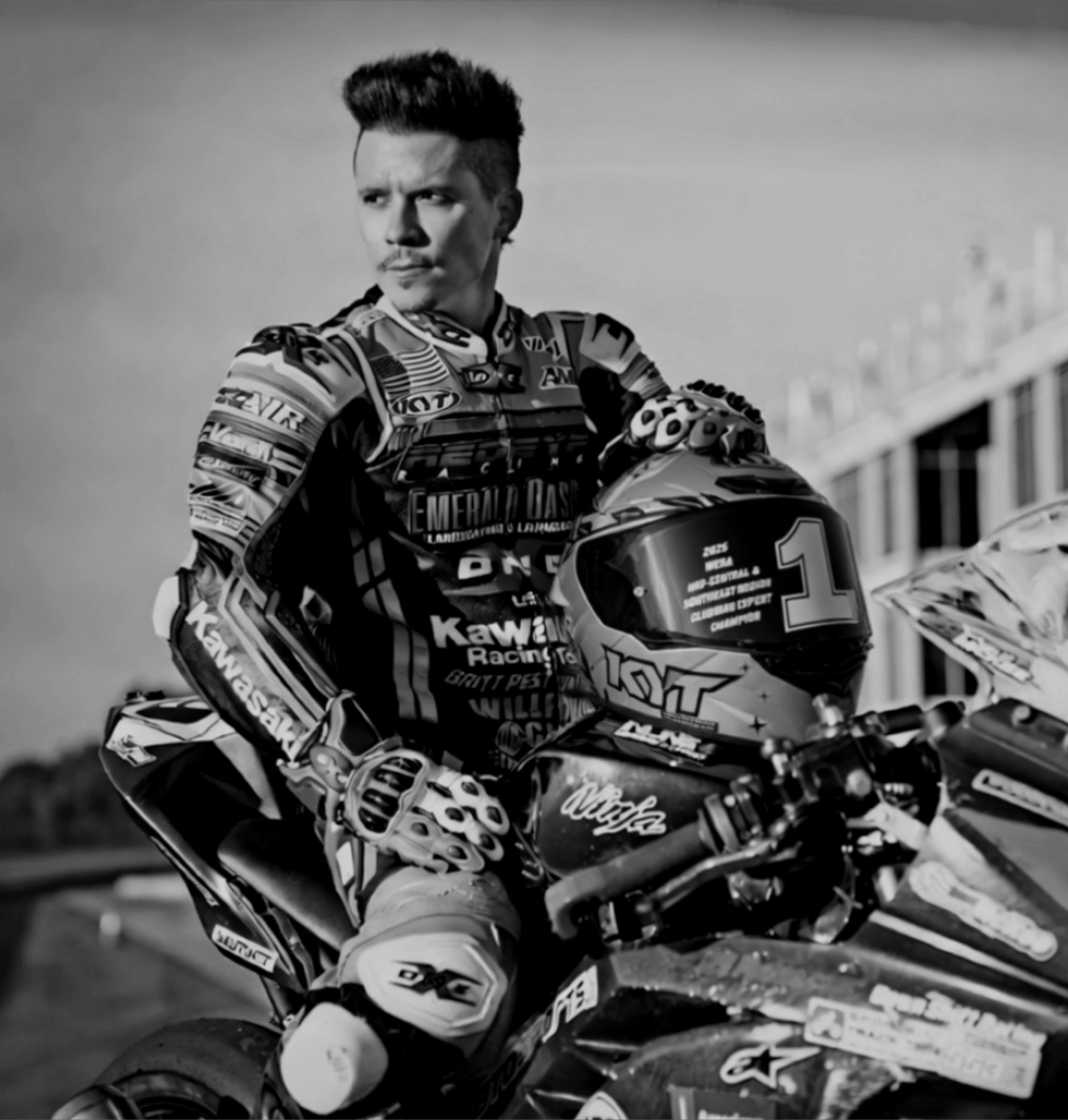 Paul McKee poses with his KYT Spirit of Speed Campeone helmet