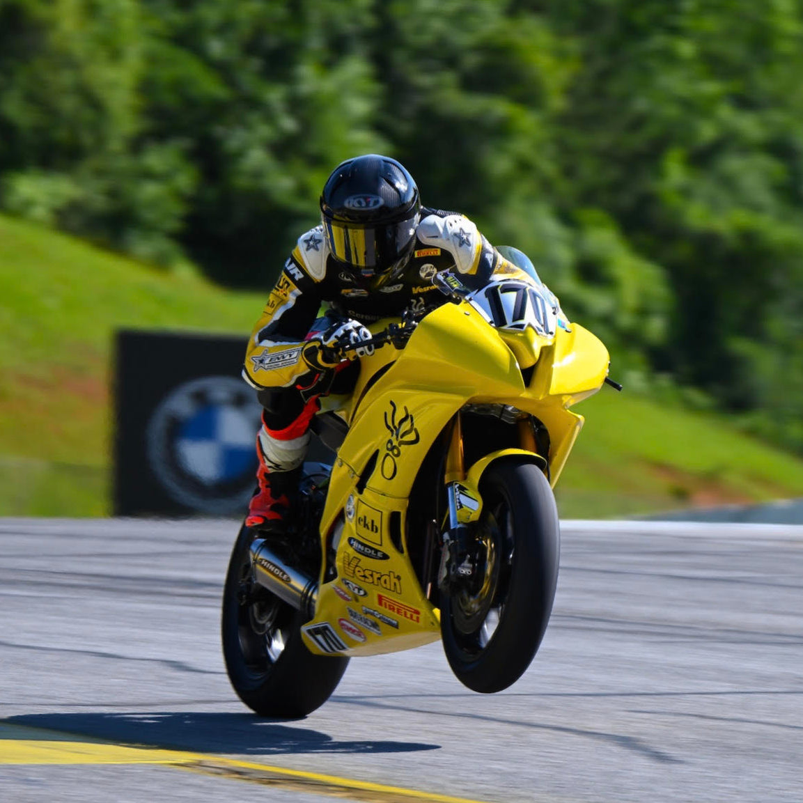 Alex Ellman Doing a wheelie with his KYT KX-1 Race GP Carbon motorcycle helmet