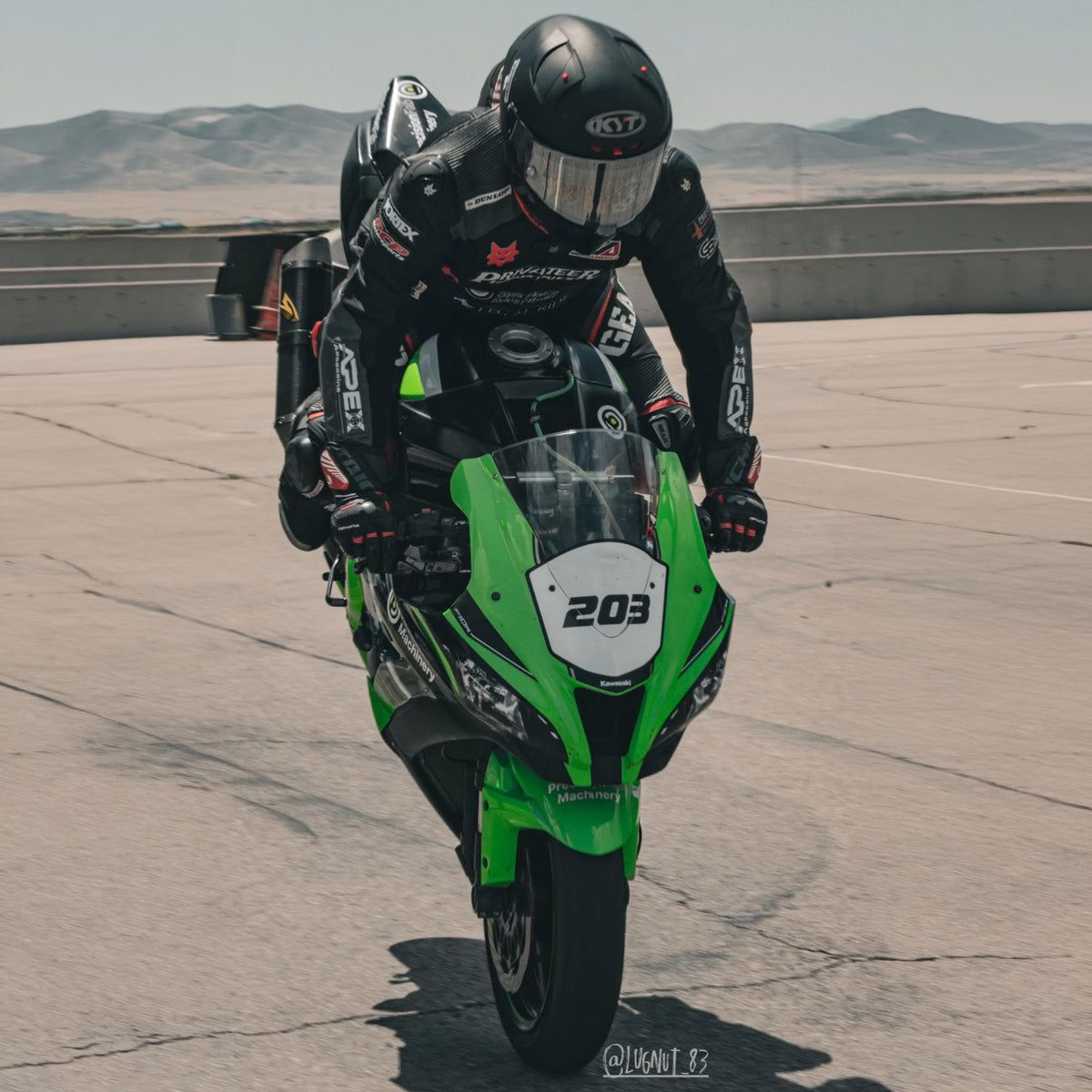 Anthony Norton doing a stoppie on his Kawasaki ZX-10R with his KYT KX-1 Race GP Motorcycle Helmet