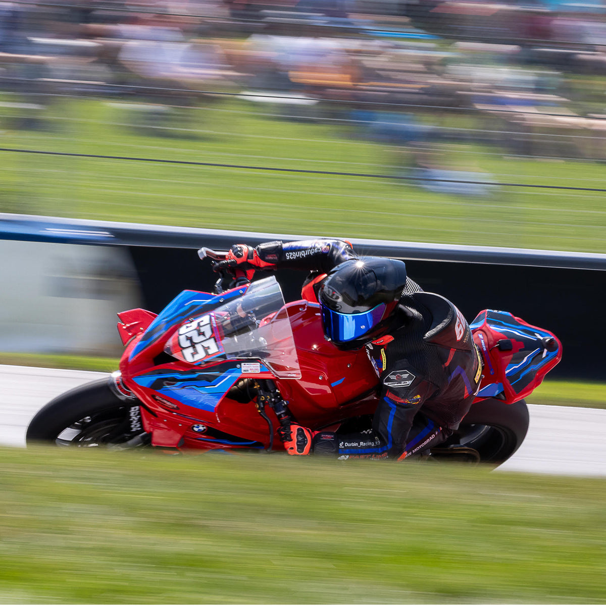 Chris Durbin piloting his motorcycle wearing his KX-1 Race GP Motorcycle helmet