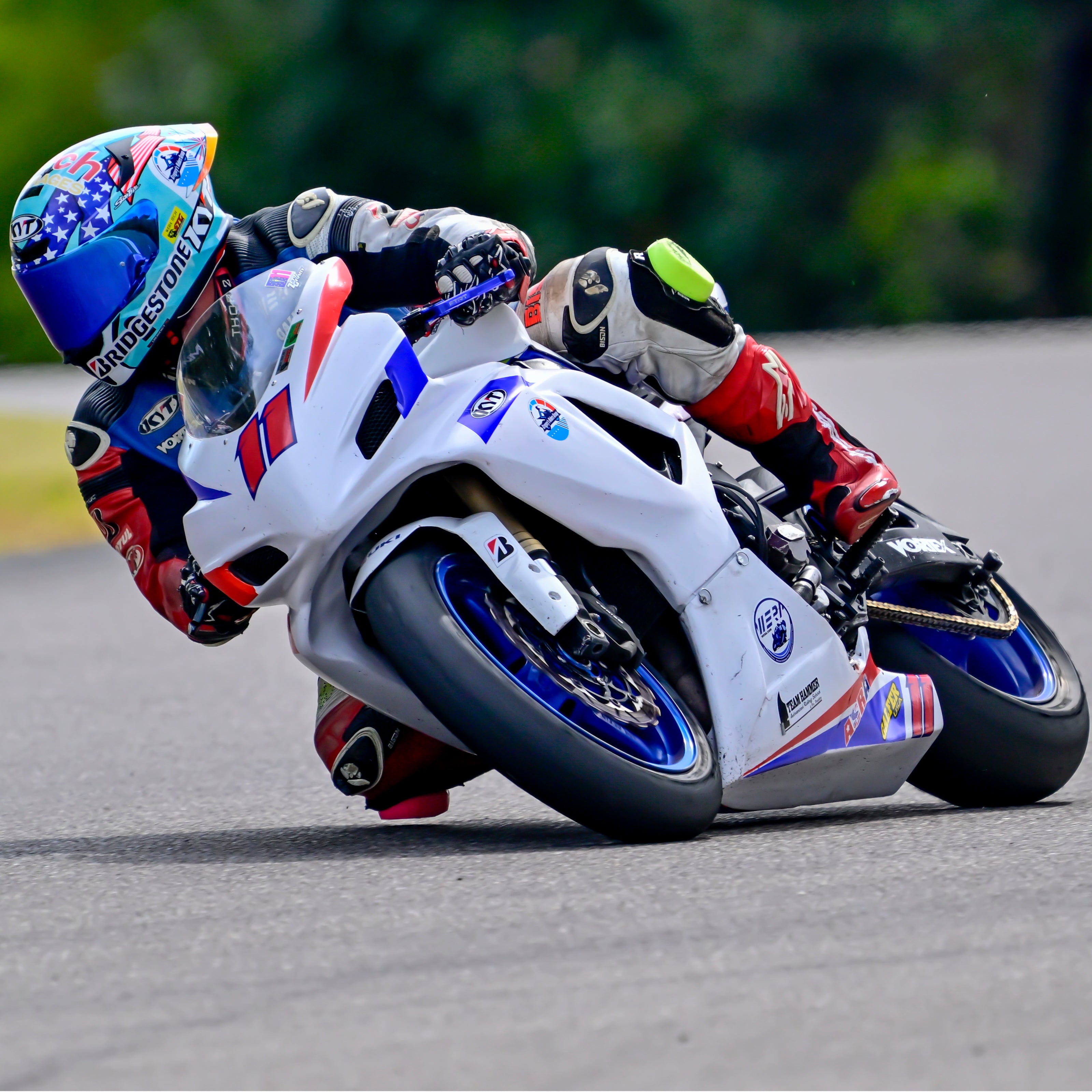 Jimmi Gregory III on the race track with his KYT TT-REVO Americas Replica Motorcycle helmet