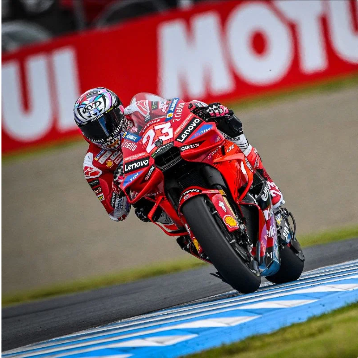 KYT rider Enea Bastianini on his red Ducati in MotoGP, wearing a custom KX-1 Race GP