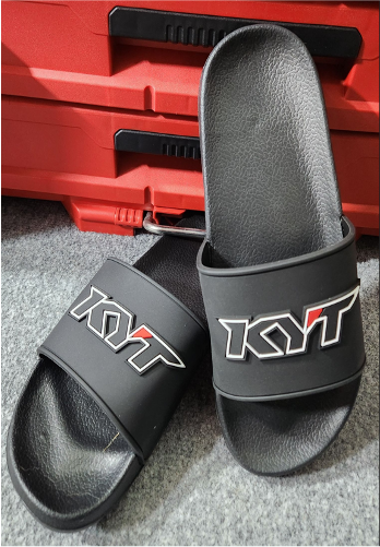 Black Slides footwear with KYT branding