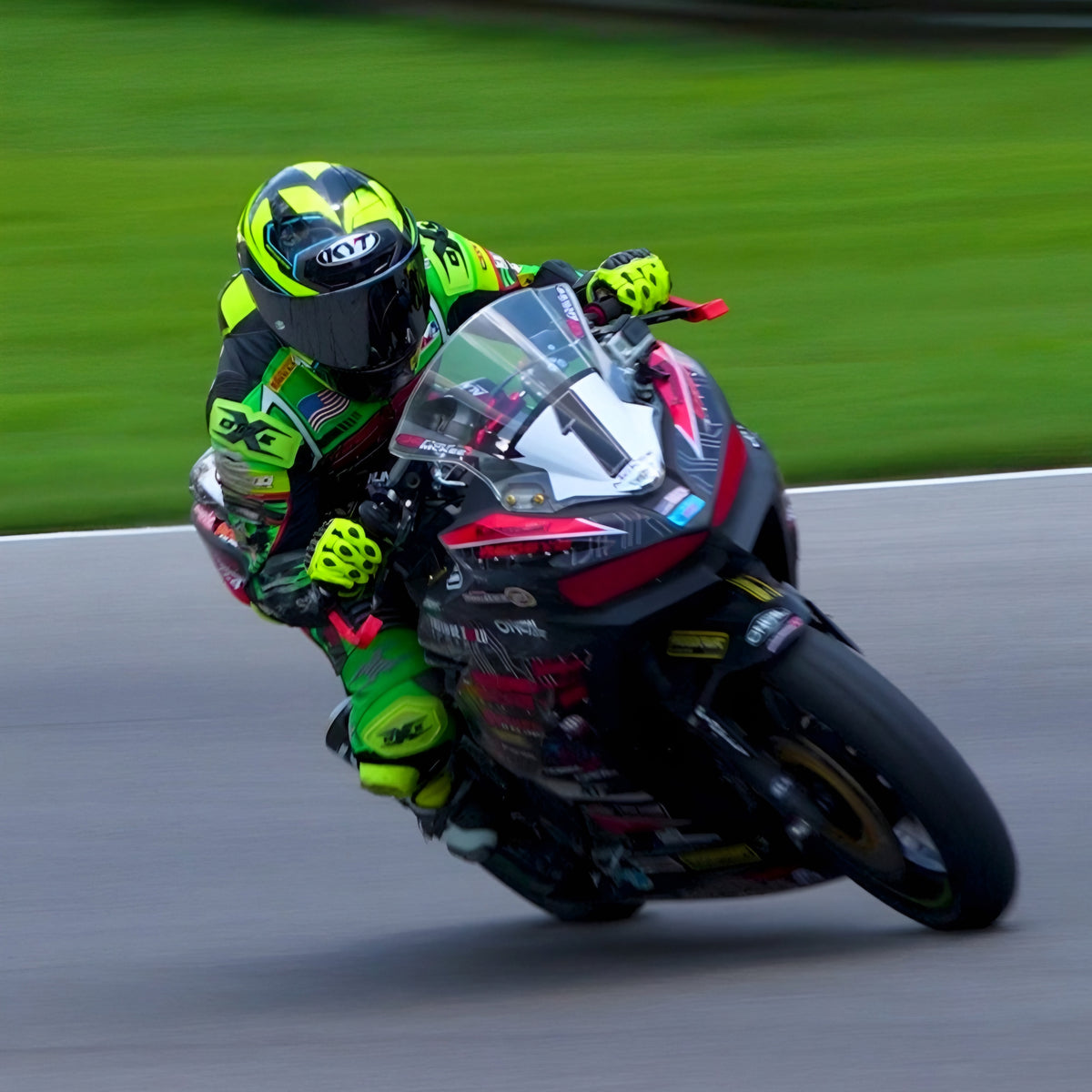 Paul Mckee piloting his motorcycle wearing his KYT NZ-Race motorcycle helmet