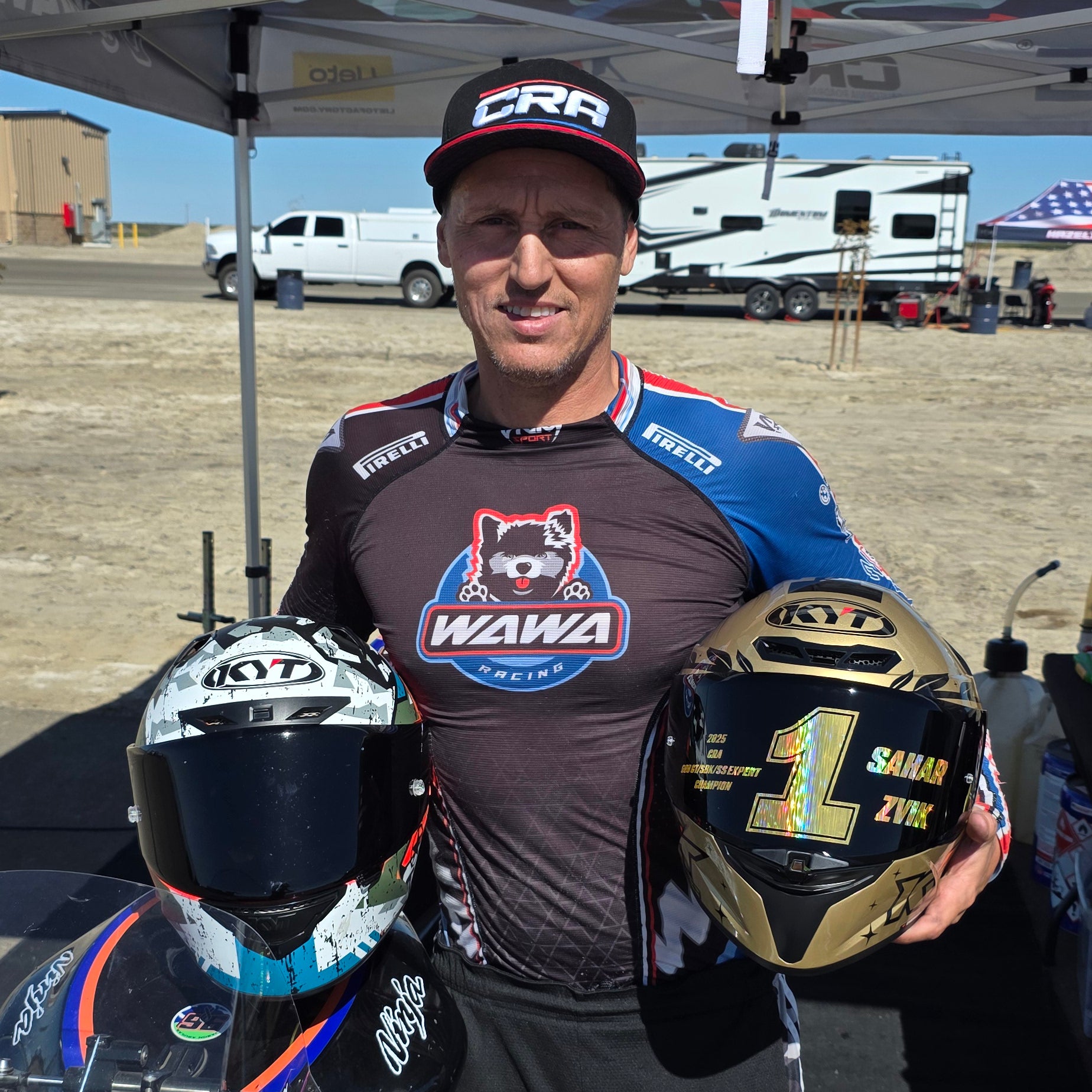 Sahar Zvik holding his KYT Spirit of Speed Champion helmet
